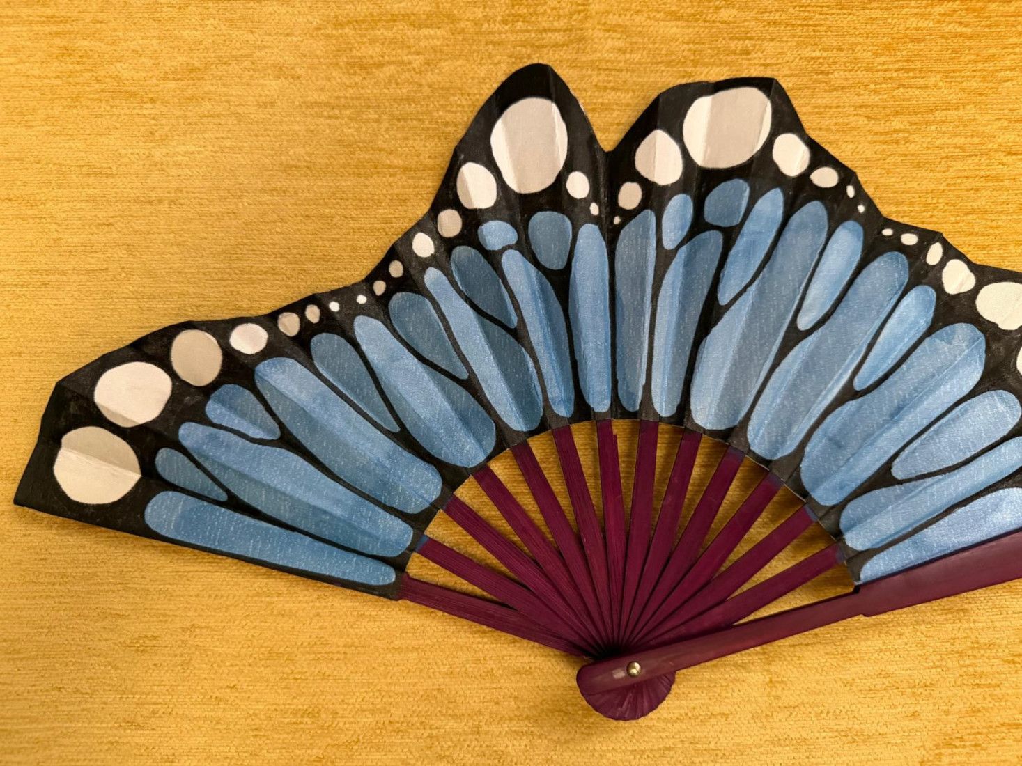 Abanico ala mariposa azul